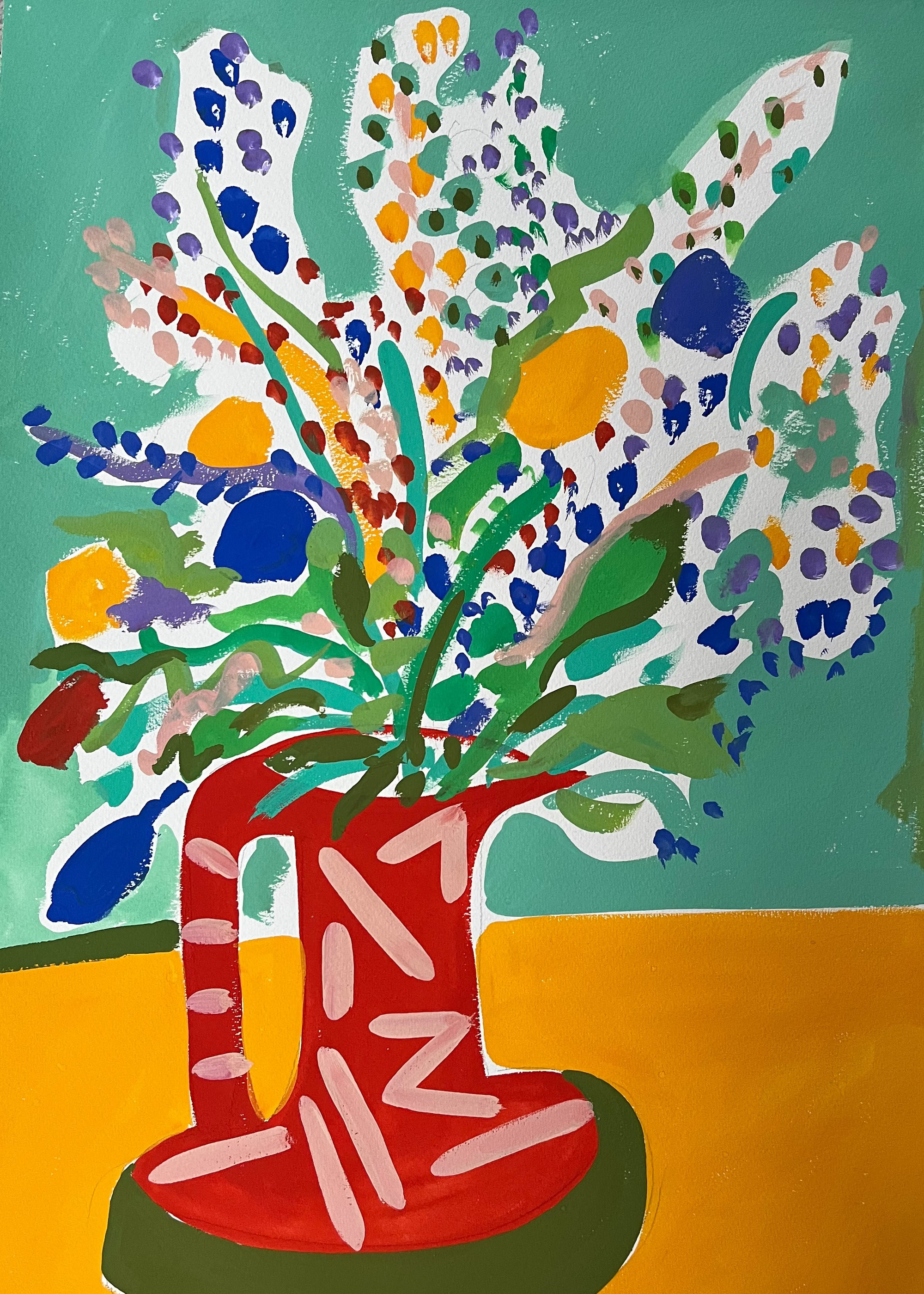 Colorful floral arrangement in a red vase on a green and yellow background